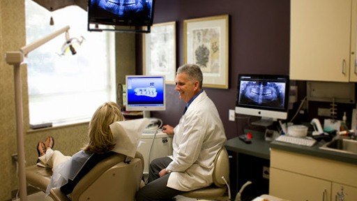 Dr. David McCarl treating dental patient